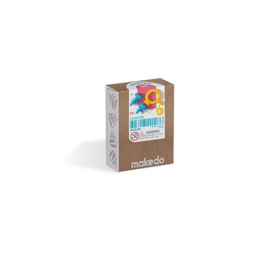A cardboard construction toolkit by Makedo, including packaging with the product visible on the inside.