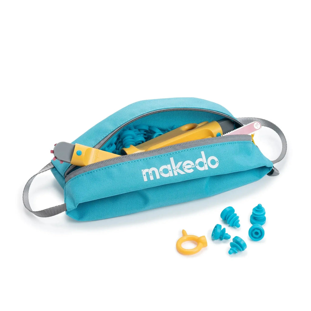 Blue carrying case with construction toys on a white background, featuring the brand 'makedo'.