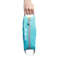 Turquoise bag with a zipper held by a hand on a white background