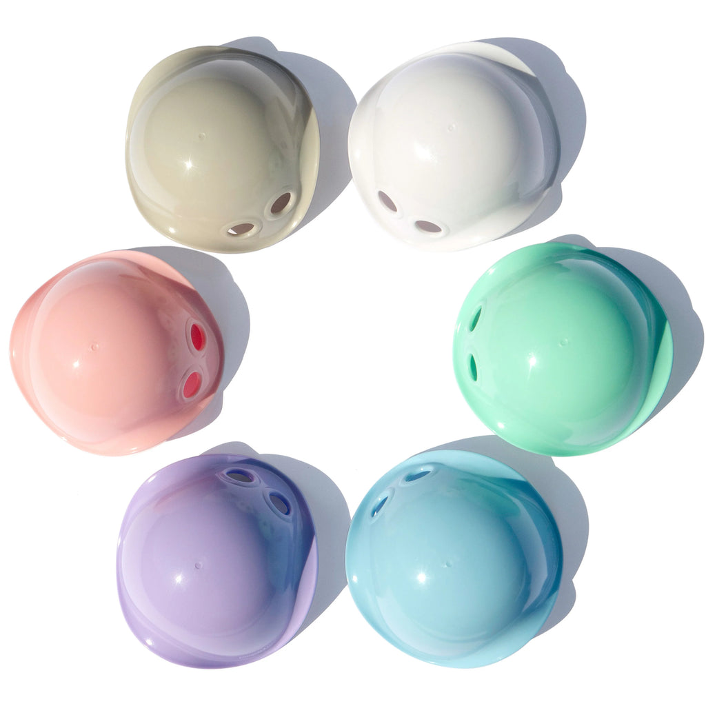 Set of six pastel-colored silicone teether toys on a white background
