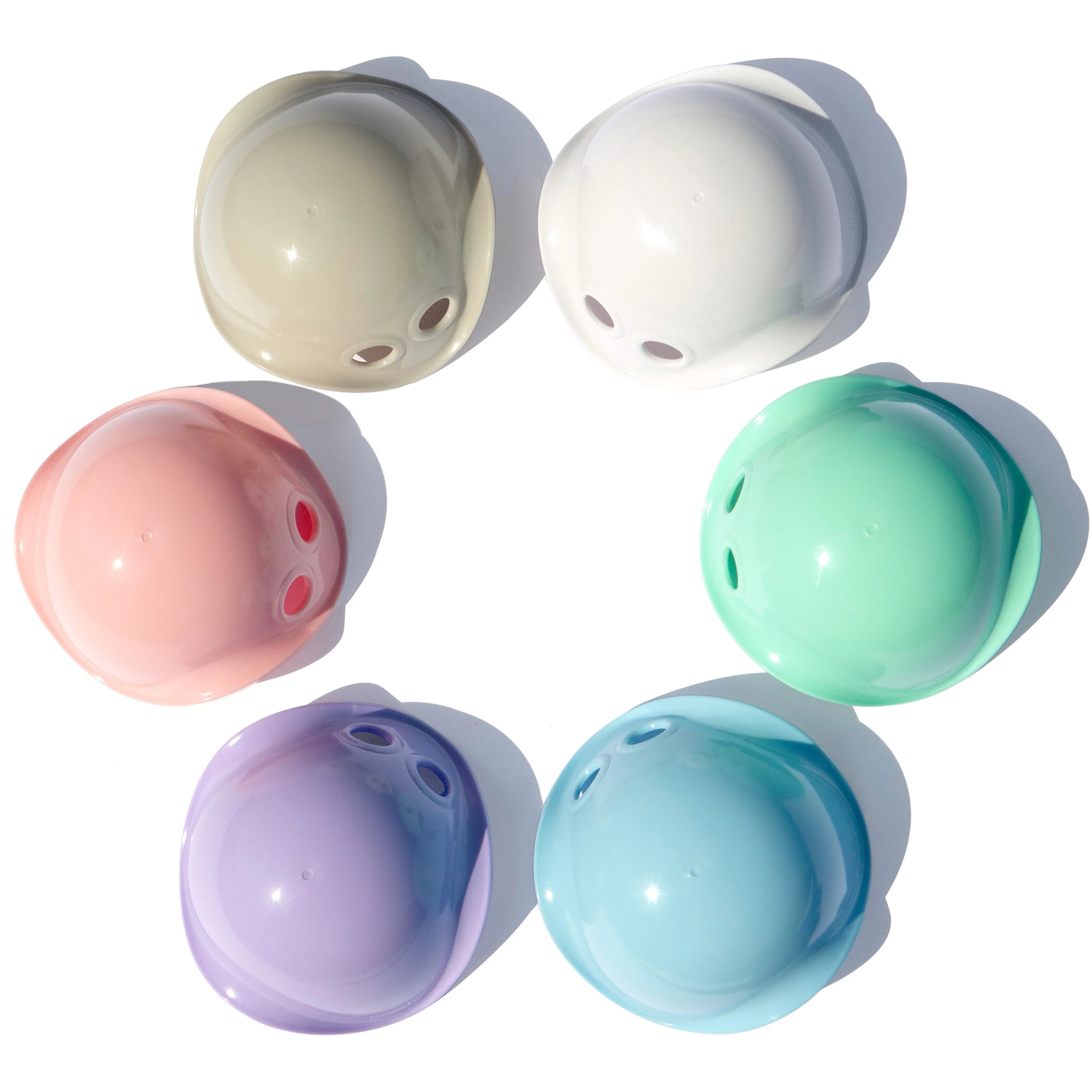 Set of six pastel-colored silicone teether toys on a white background