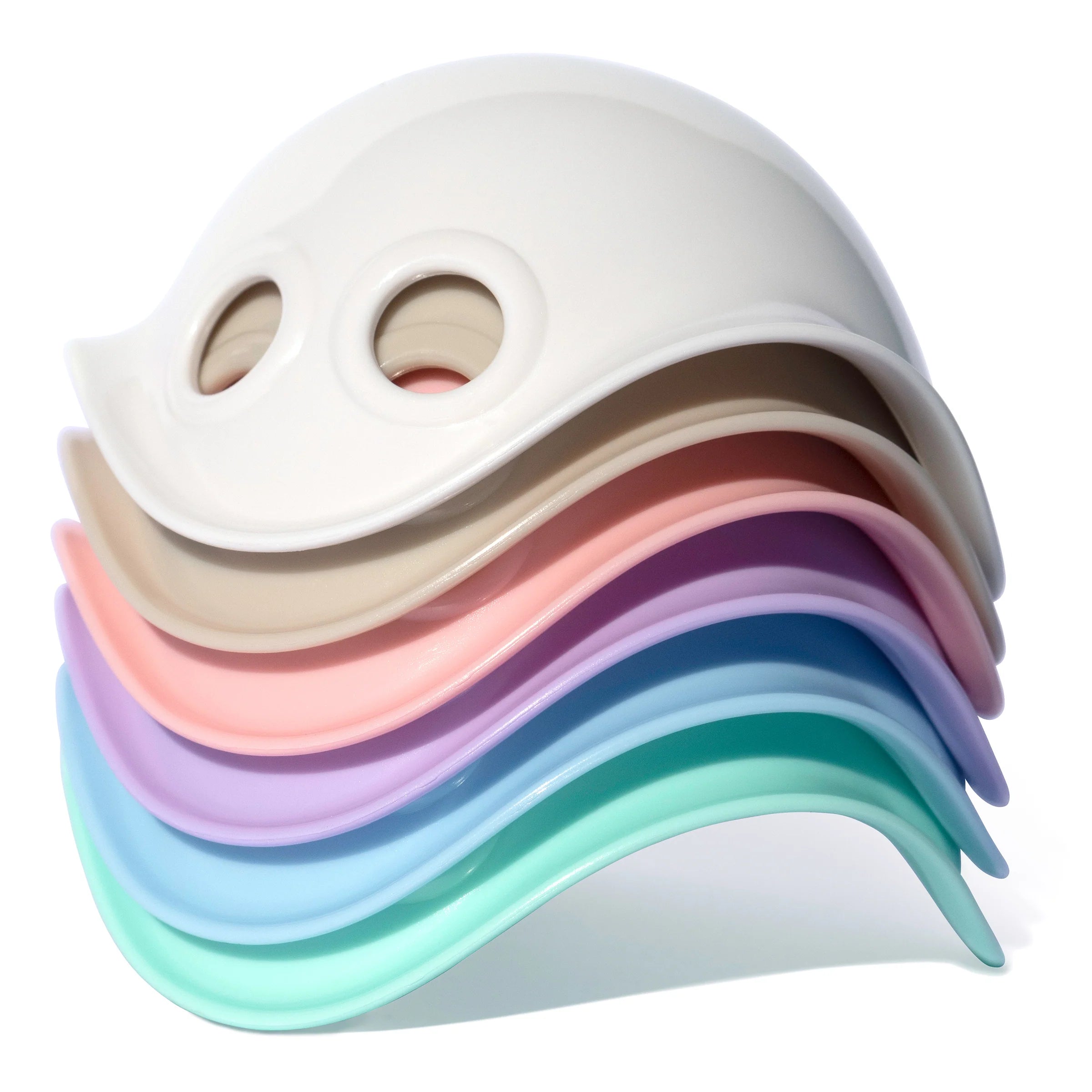 Stack of colorful silicone coasters with a smiley face design on a white background