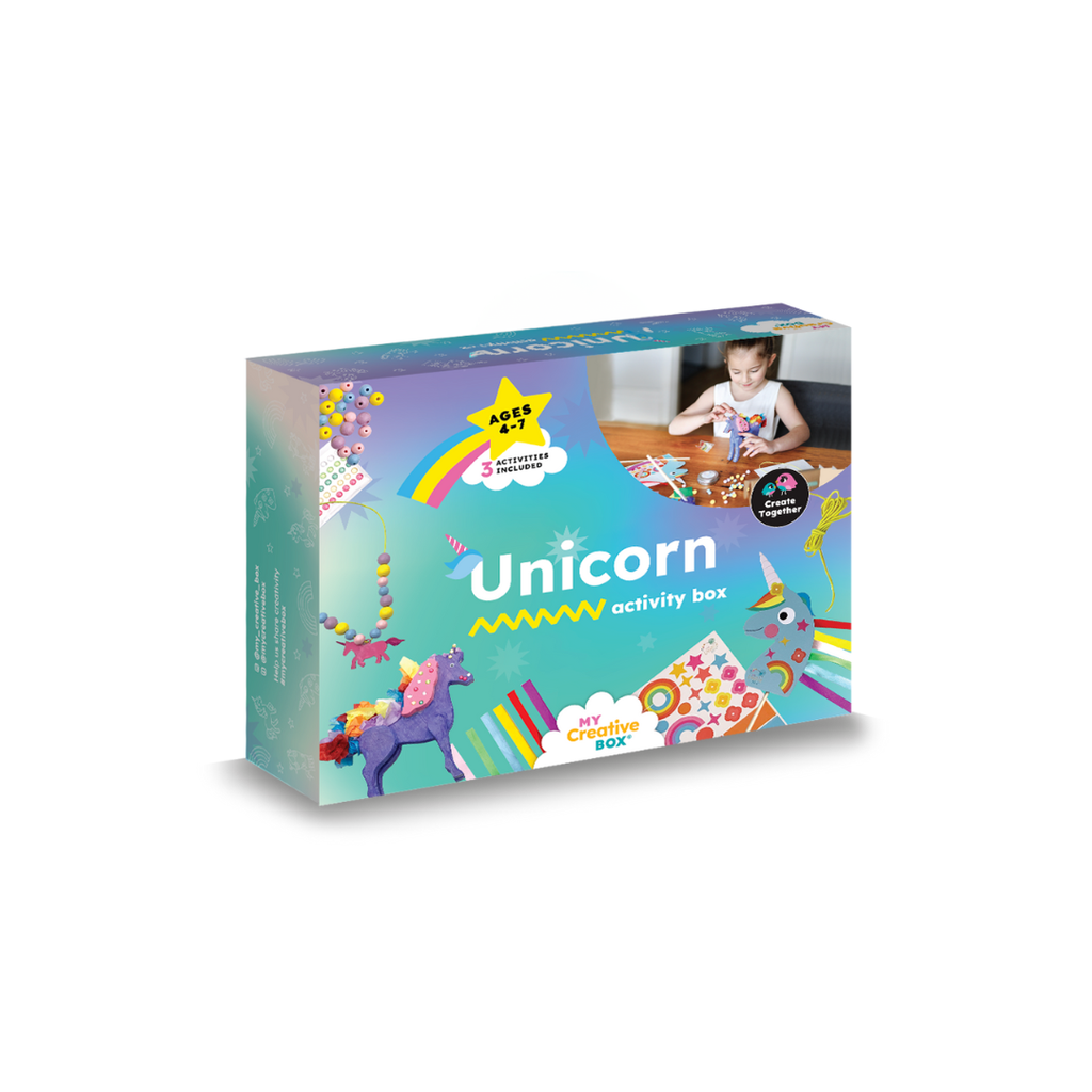 A box of Unicorn themed craft activities featuring images of a child with a unicorn craft, a unicorn wand, and a wooden 3D unicorn.