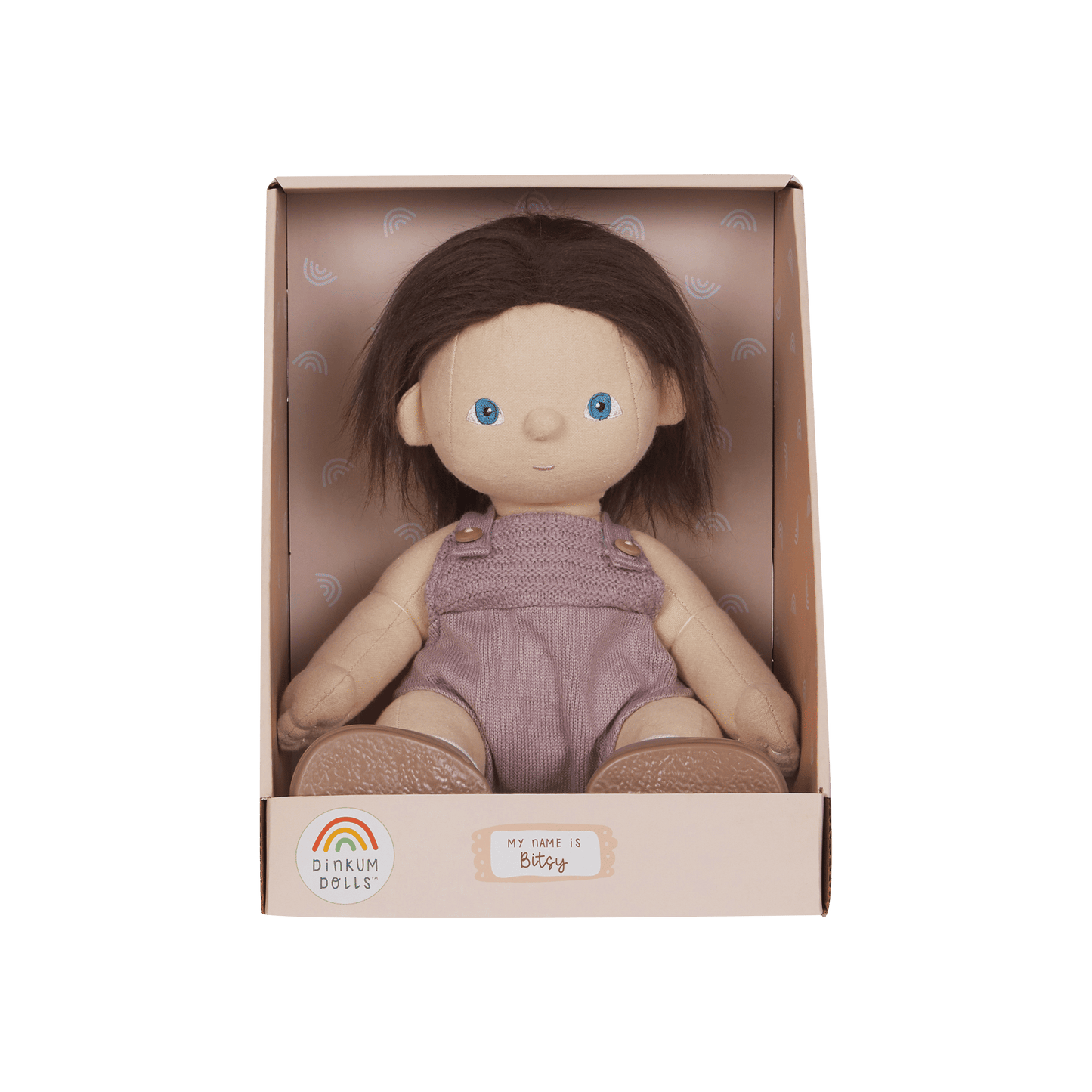 Dinkum Dolls doll in a pink box on a green background