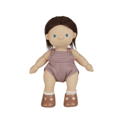 Toy doll with brown hair, blue eyes, and a purple outfit on a transparent background