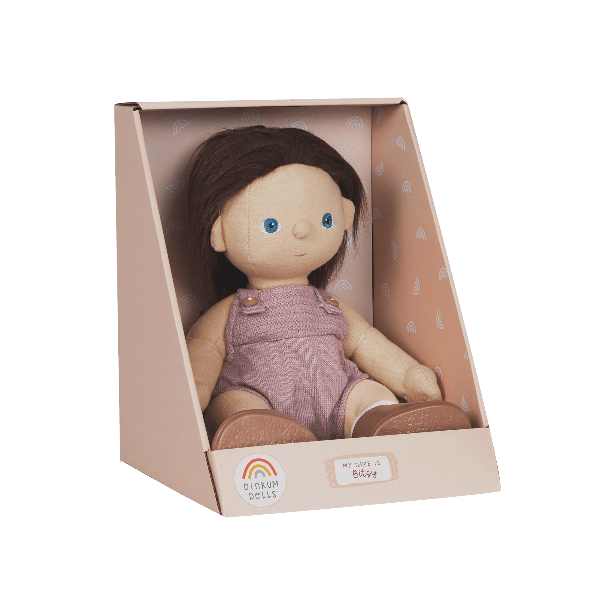 Doll in a pink box with a green background