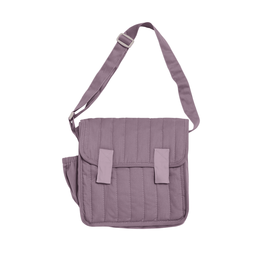 Purple quilted bag with a strap on a white background