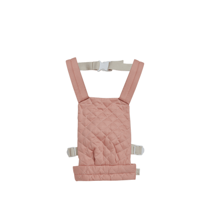 Pink baby carrier with straps on a white background