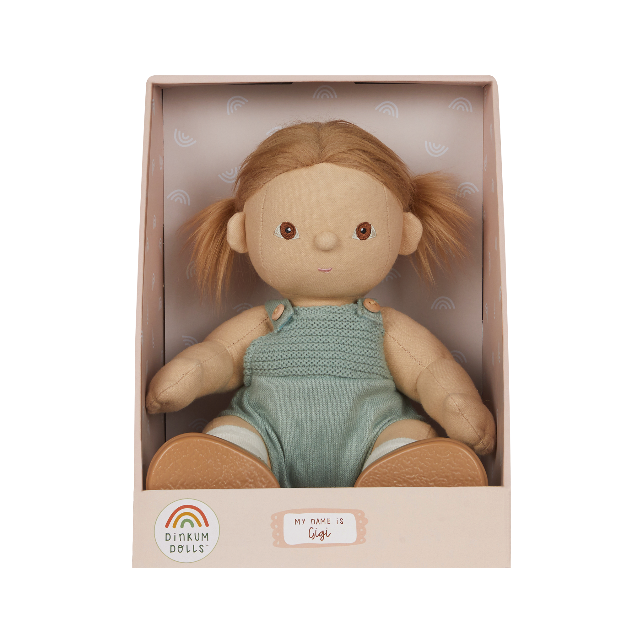 Doll in a box with 'Dinkum Dolls' branding on a white background