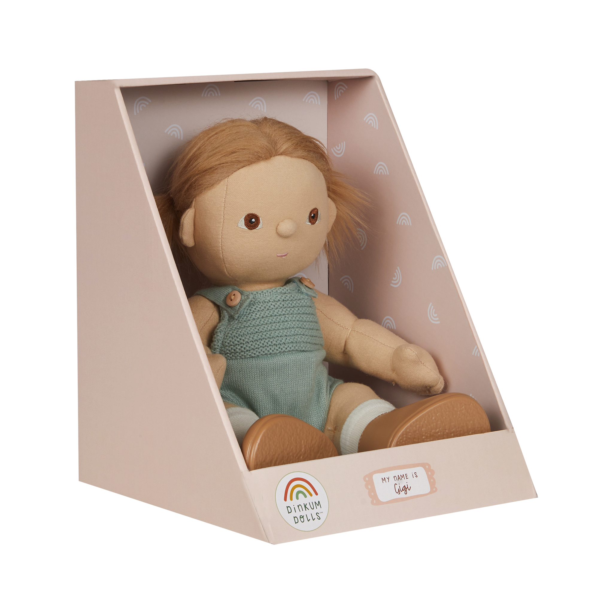 Toy doll in a box with a soft pink interior