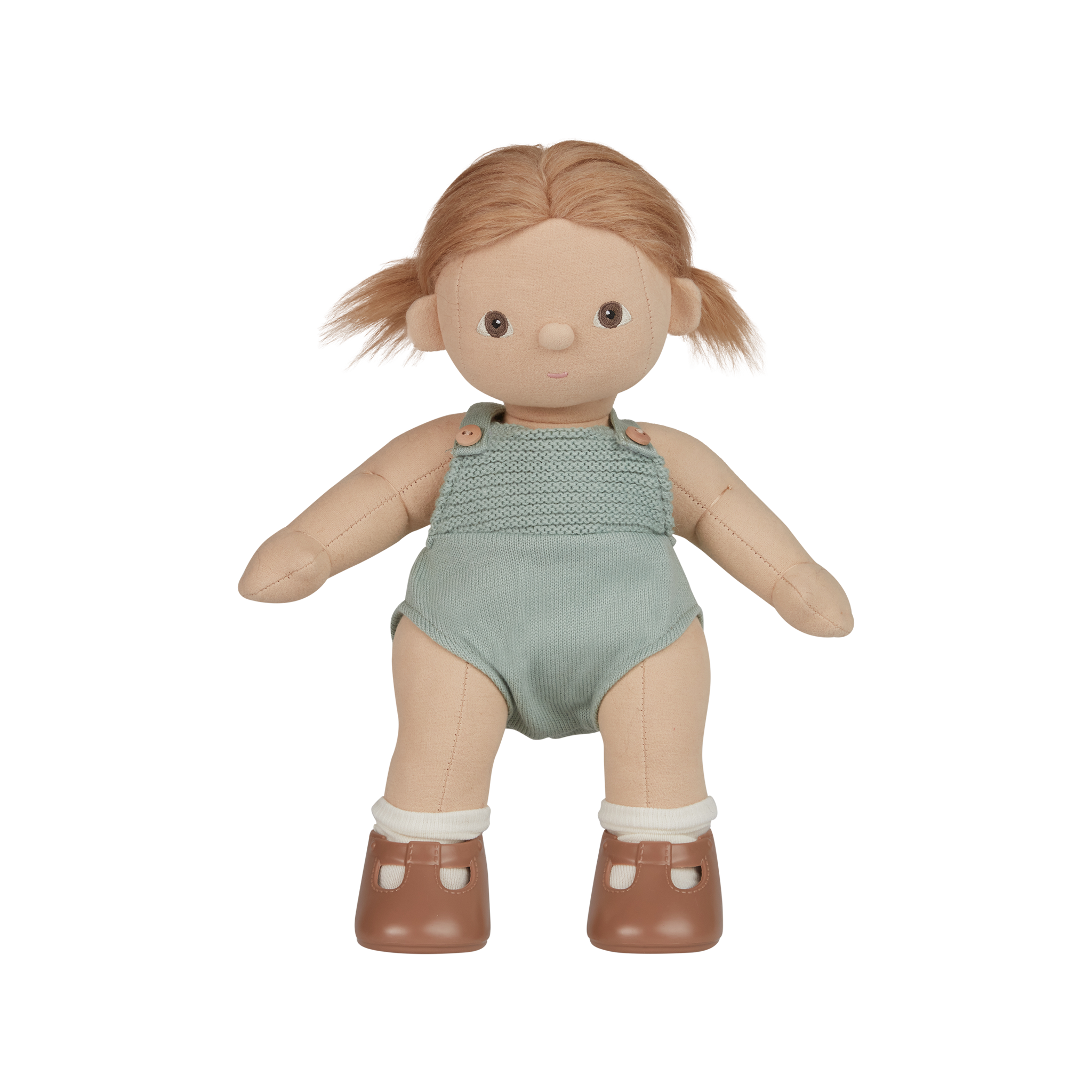 Toy doll with blonde hair wearing a green outfit on a white background