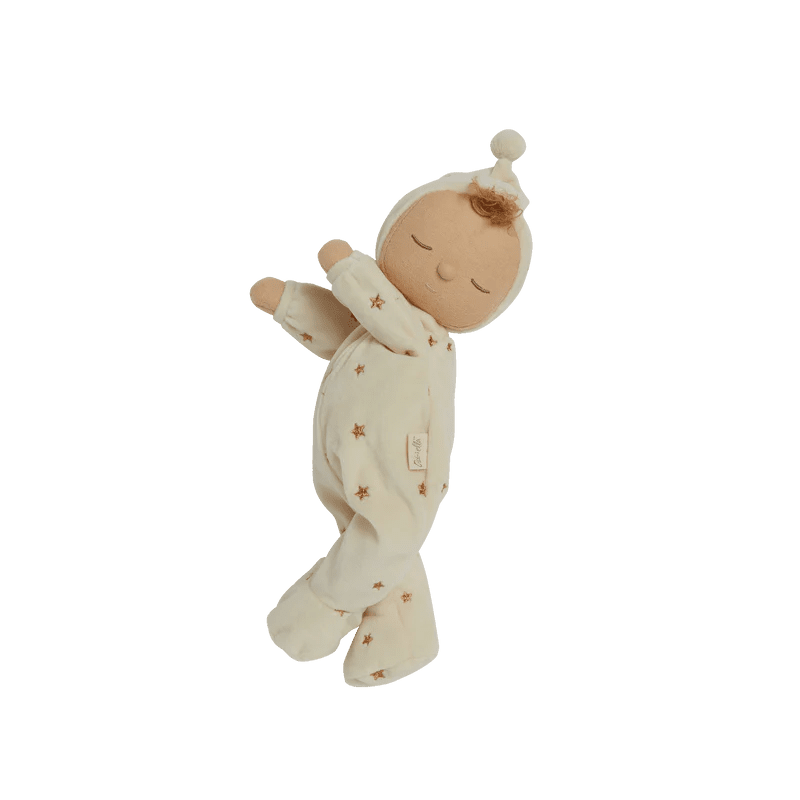 Stuffed baby toy with a white blanket and star pattern on a white background