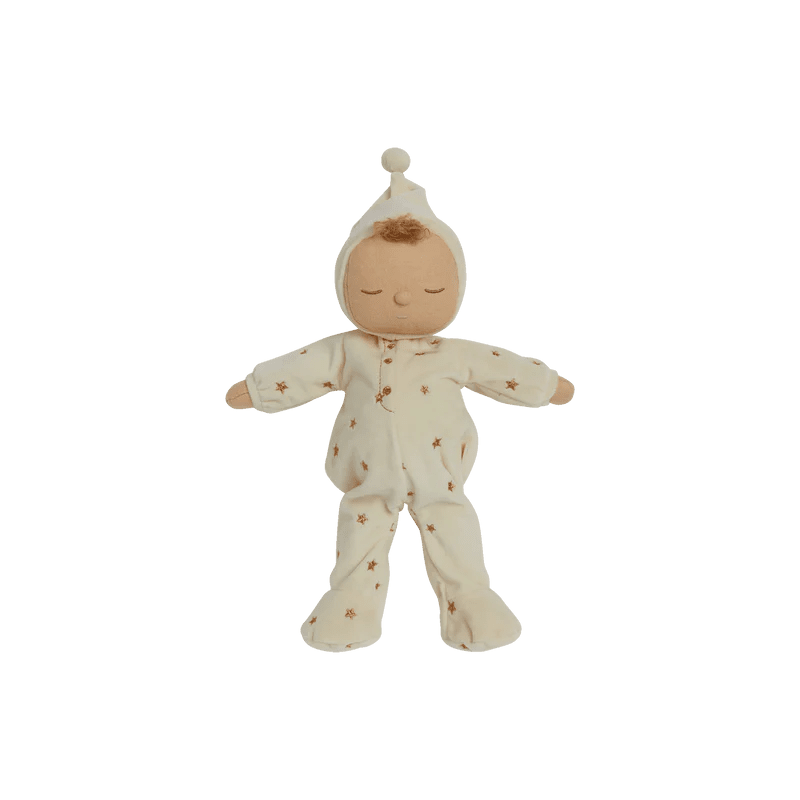 Baby doll in a white outfit with star patterns on a white background