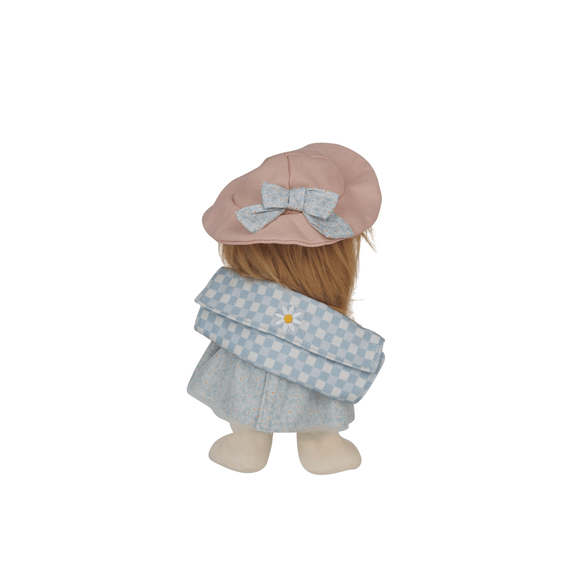 Stuffed toy with a pink hat and light blue dress on a white background