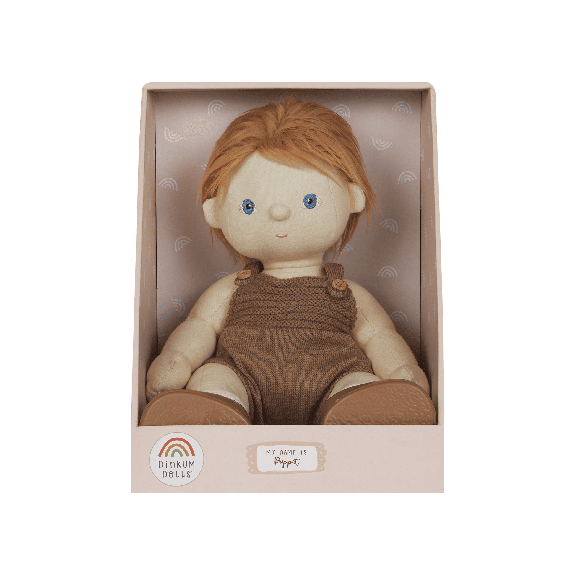 Toy figure in a brown outfit with blue eyes in a pink box on a green background