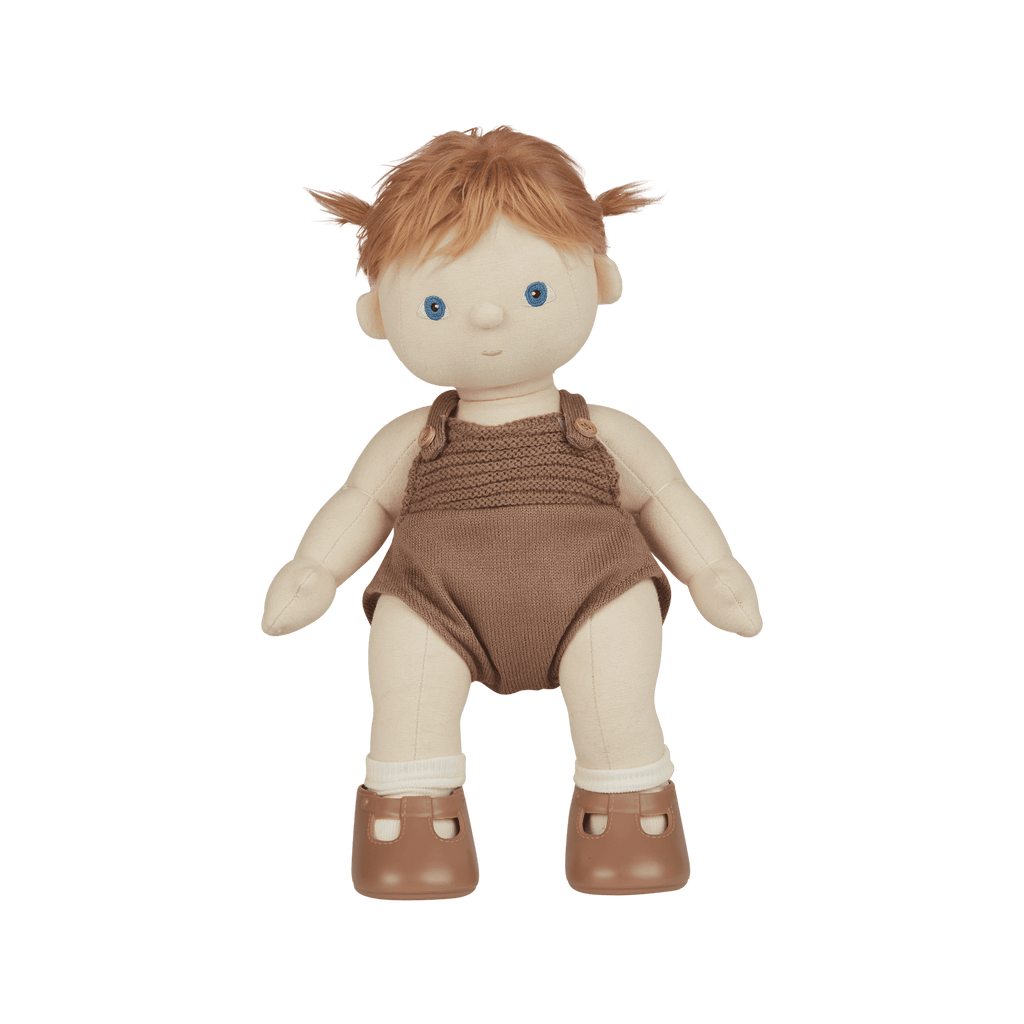Toy doll with red hair wearing a brown outfit on a transparent background