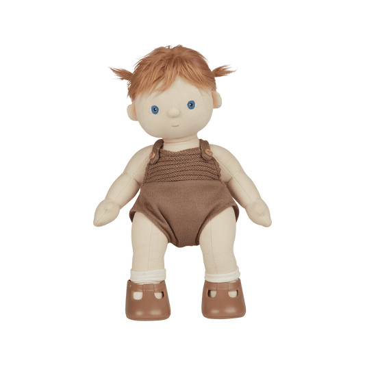Toy doll with red hair wearing a brown outfit on a transparent background