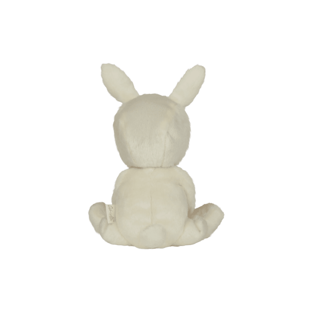 White plush toy with rabbit-like features on a white background