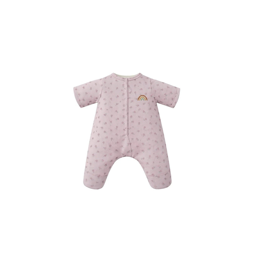 A light pink baby sleep suit with a small rainbow graphic on the chest, displayed on a solid white background.