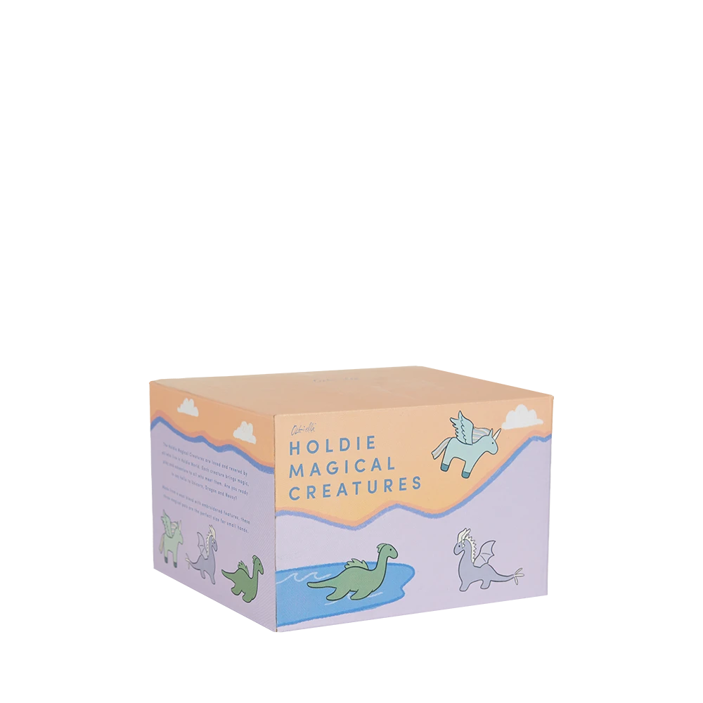 Box with illustrations of magical creatures and text on a white background