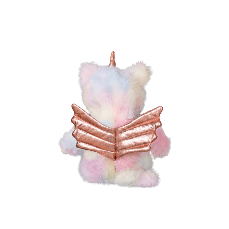 Plush toy unicorn with rainbow-colored body and rose gold wings on a white background