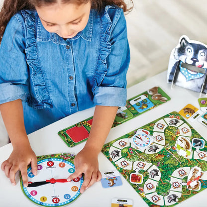 Child playing with a educational board game on a table