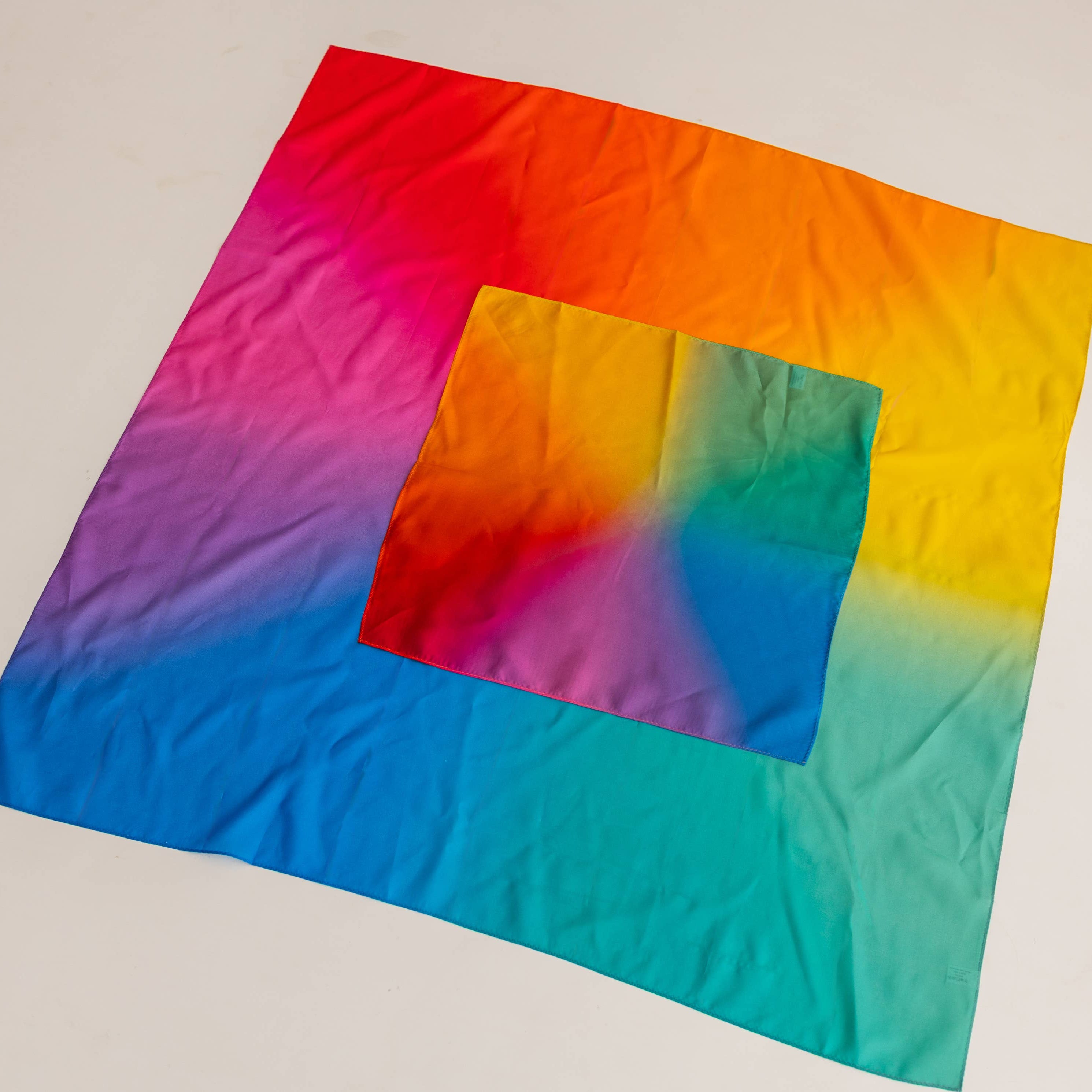 Colorful tie-dye fabric on a white background