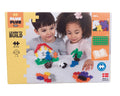 Plus Plus building block set packaging with two children playing with blocks