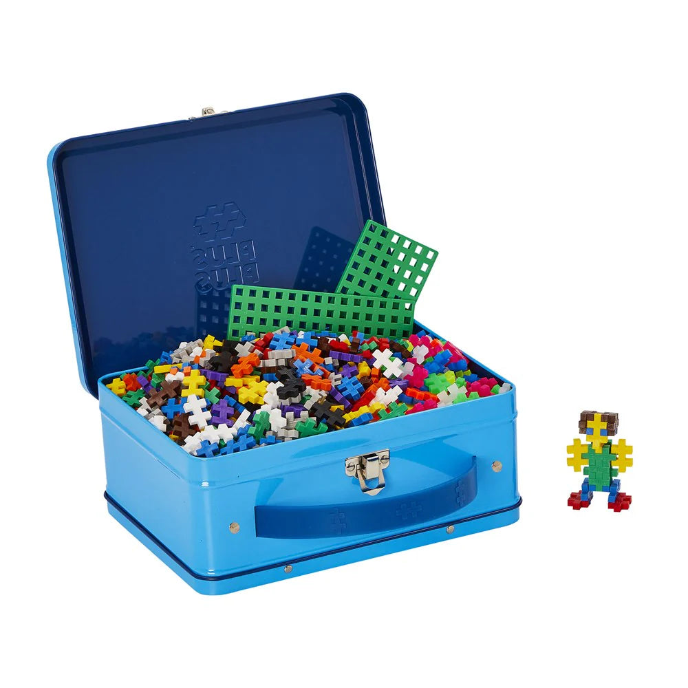Blue case with colourful building blocks and a small structure on a white background