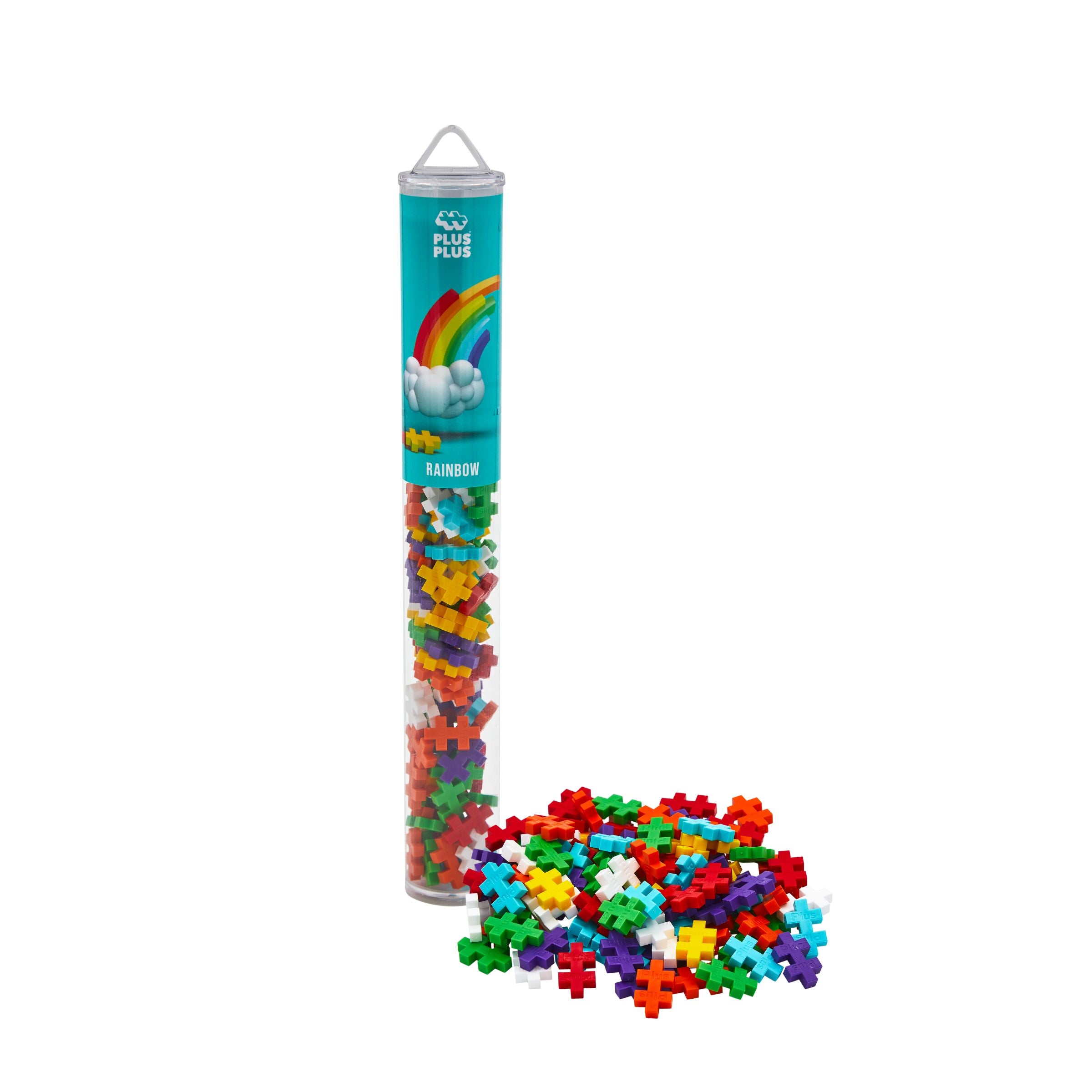 A tube with the Plus-Plus brand visible at the top, filled with colorful construction blocks spilled out next to it.
