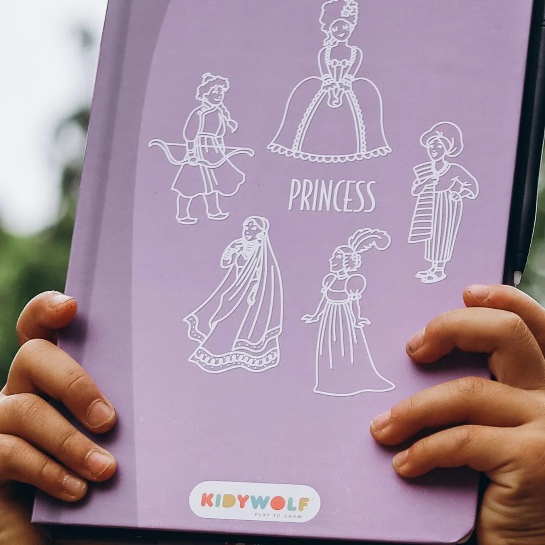 Purple notebook with princess illustrations held by a child's hands, featuring the brand 'KIDYWOLF'.