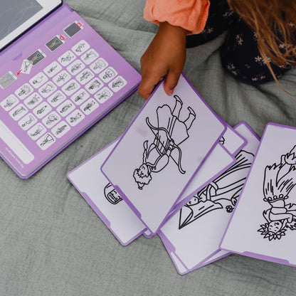 Purple educational tool with illustrations on a gray surface