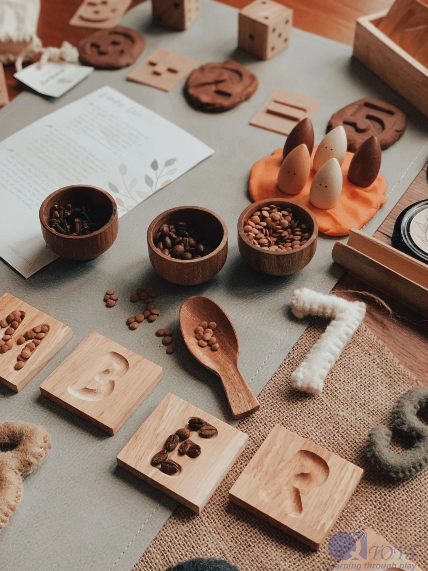 Wooden kitchen tools and ingredients on a table