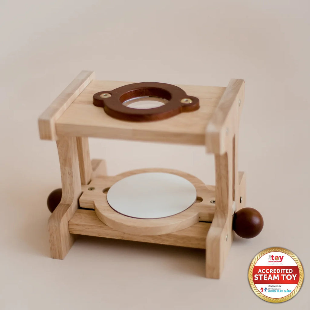 A wooden microscope educational toy made of wood, featuring a stage with knobs, a magnifying lens, and a sturdy base.