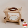 A wooden microscope educational toy made of wood, featuring a stage with knobs, a magnifying lens, and a sturdy base.