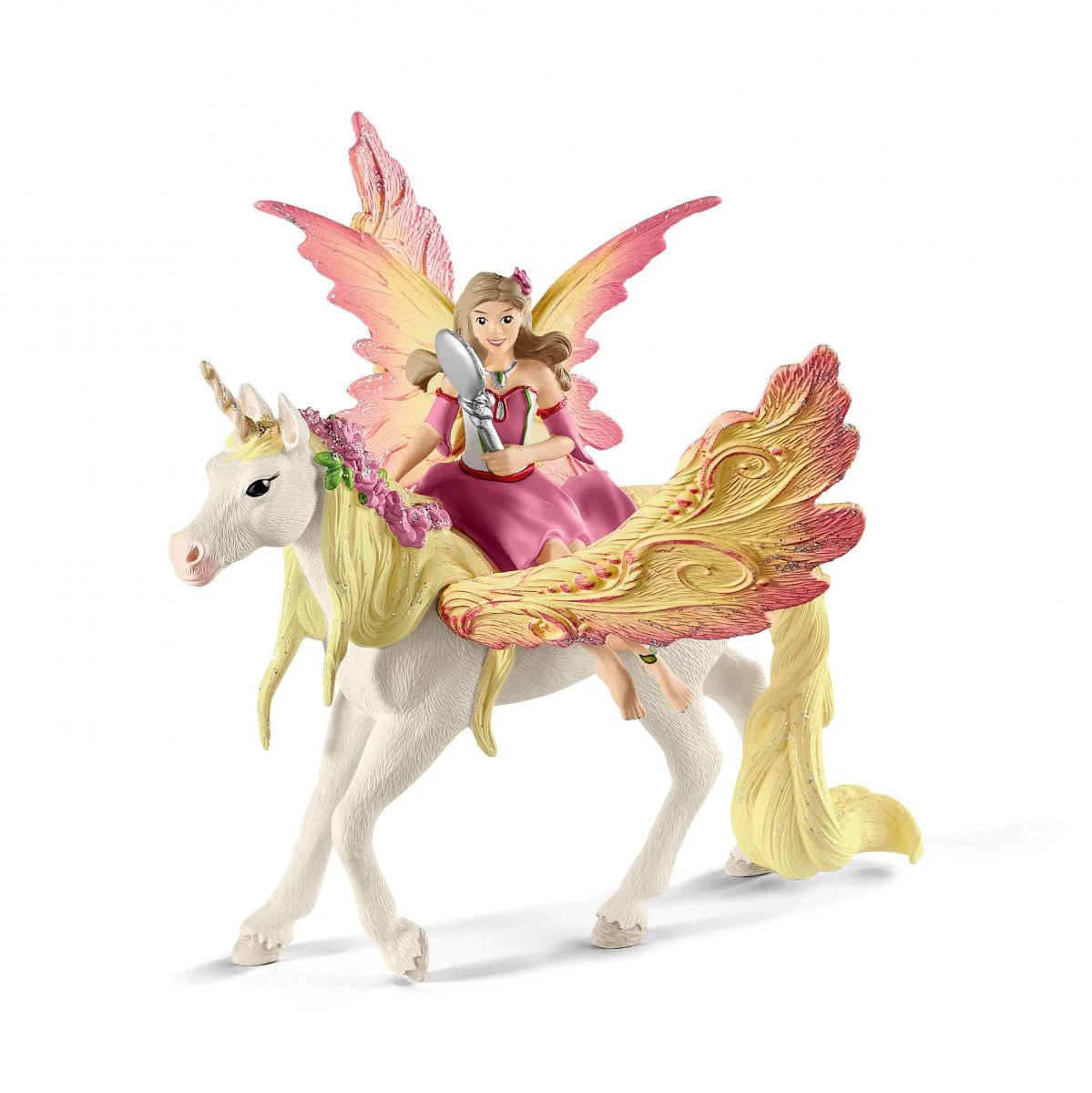 Toy figure of a fairy riding a unicorn with colorful wings on a white background
