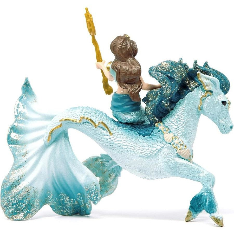 Figurine of a woman riding a blue merhorse on a white background