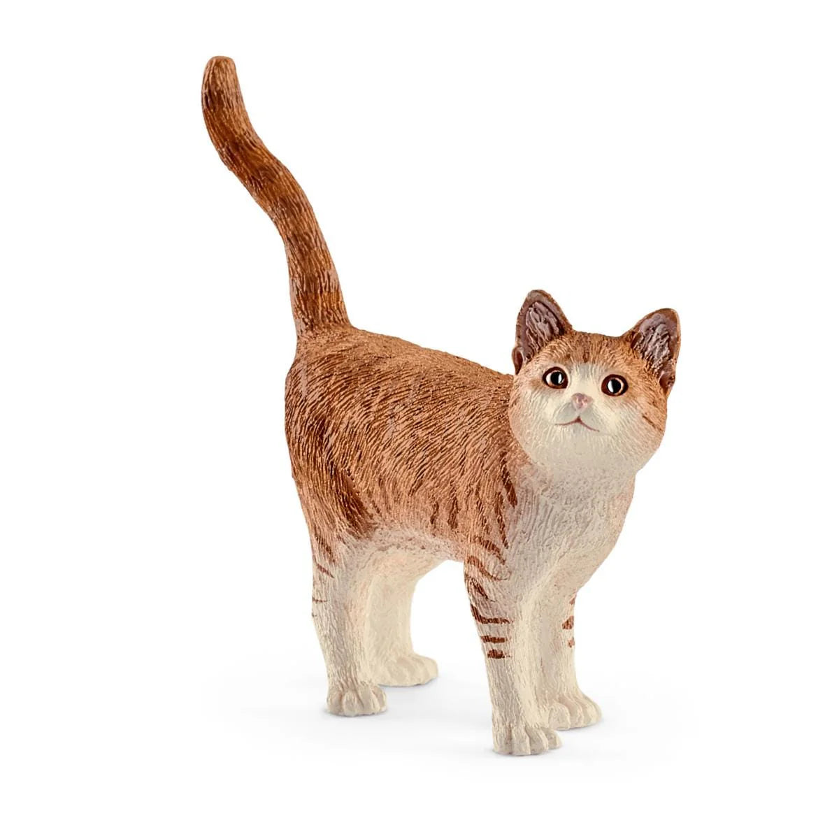 Cat figurine with orange and white fur on a white background