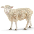 White sheep figurine on a white background