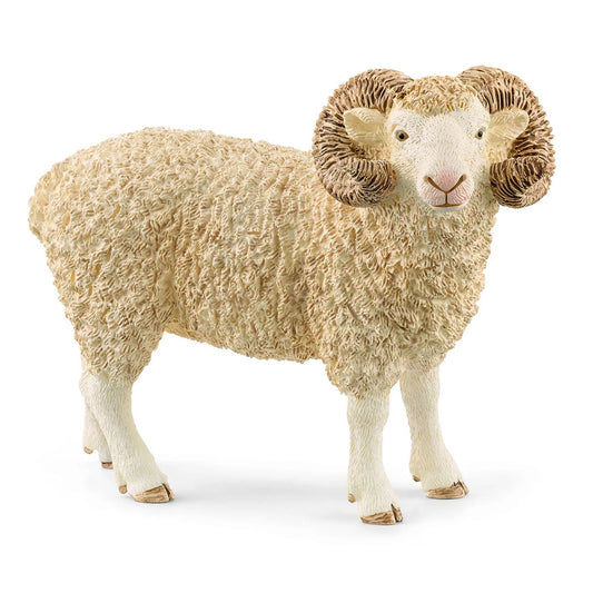 Sheep figurine with large horns on a white background