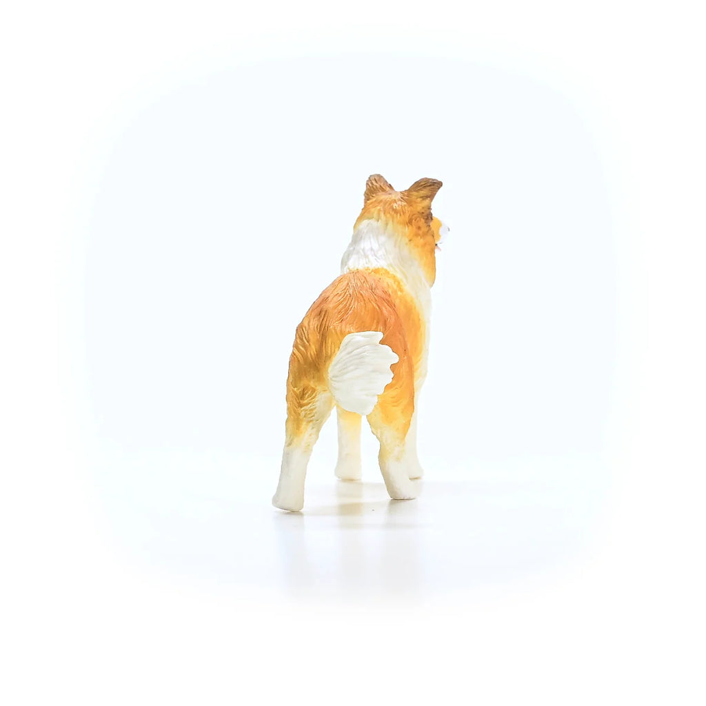 Toy fox figure on a white background