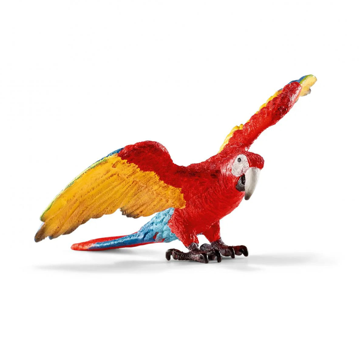 Colorful Macaw figurine on a white background