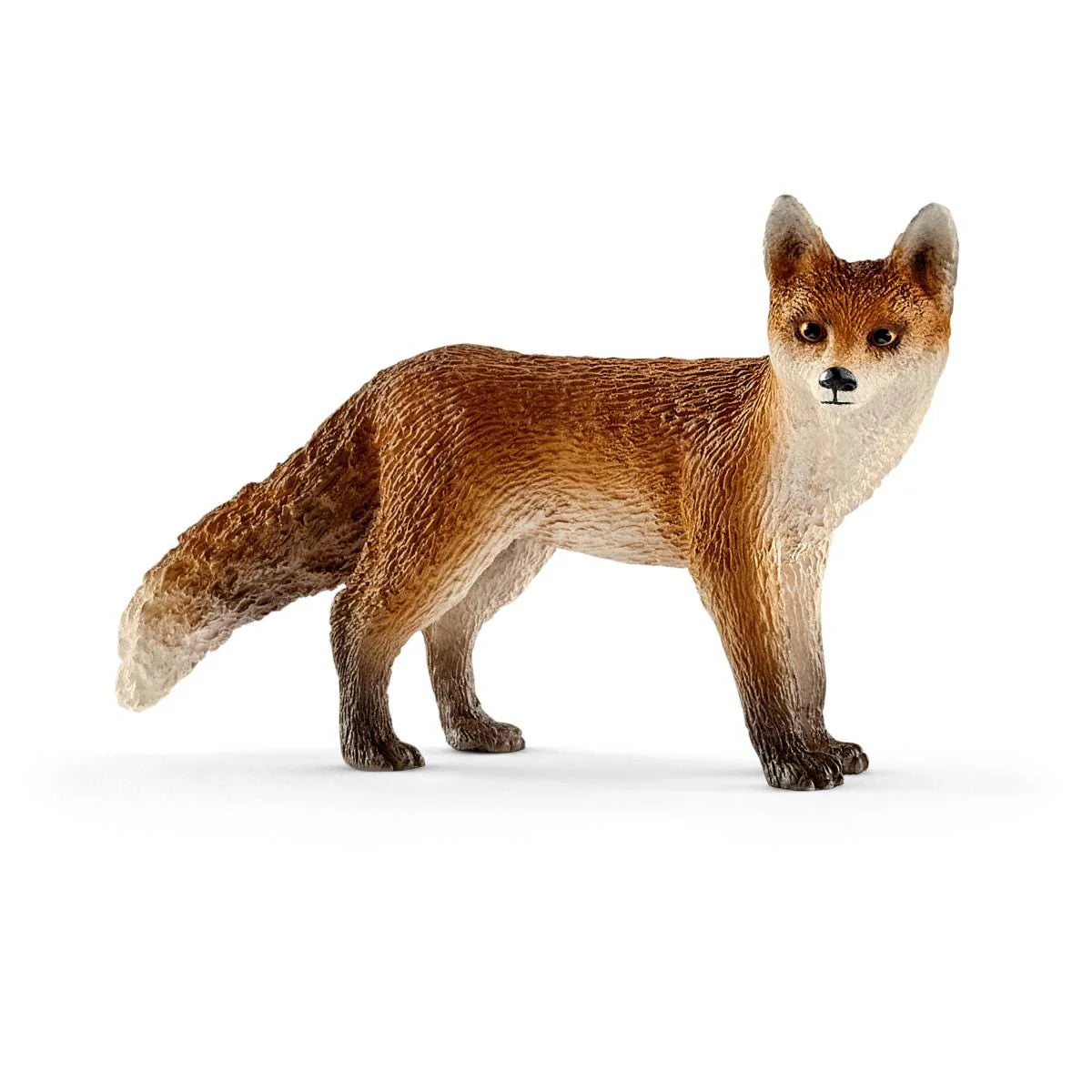 Realistic toy fox figure on a white background