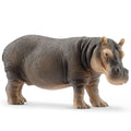 Hippopotamus figurine on a white background