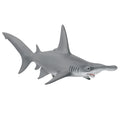 Gray shark toy figure on a white background