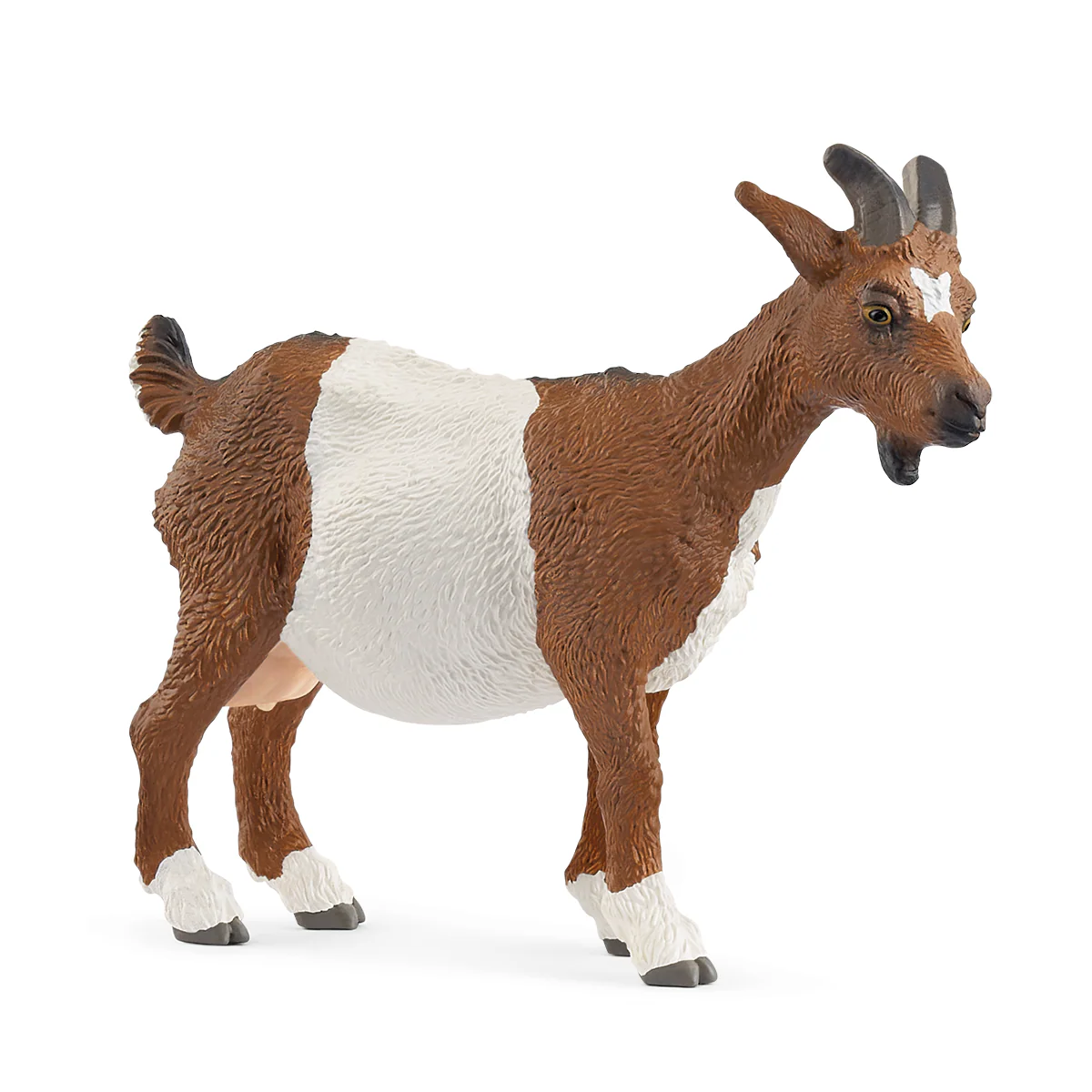 Toy goat figure with brown and white coloring on a white background