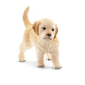 Toy dog figure on a white background