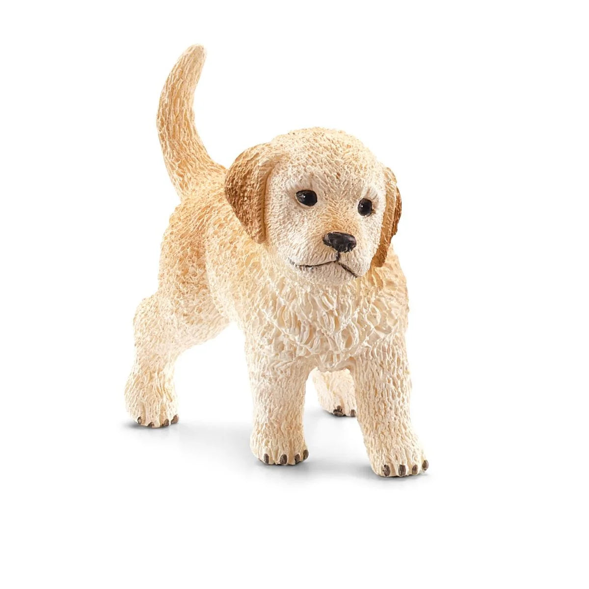 Toy dog figure on a white background