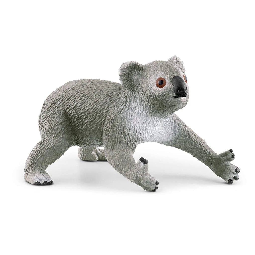Toy koala figure on a white background