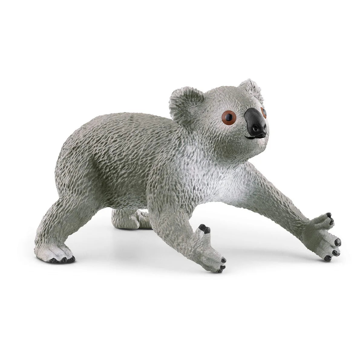 Toy koala figure on a white background